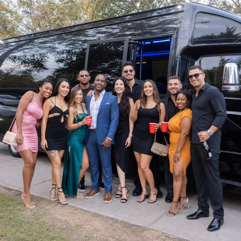 Party bus interior with wraparound leather seating and LED lighting in Washington