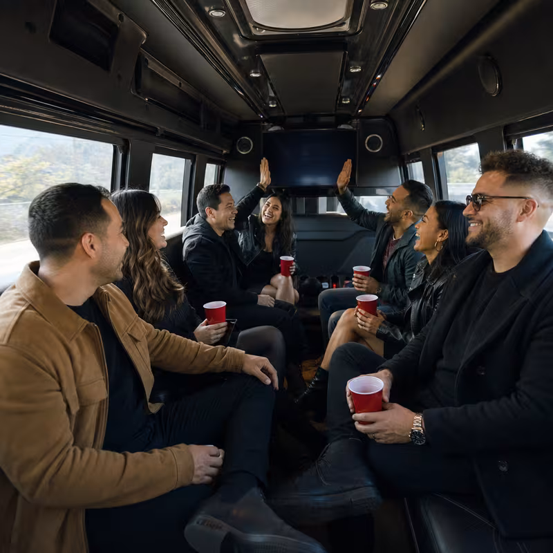 Group boarding a white charter bus for Concert Transportation transportation in Washington