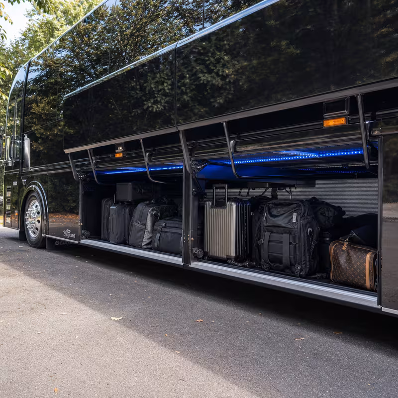 Party bus interior with wraparound leather seating and LED lighting in Washington