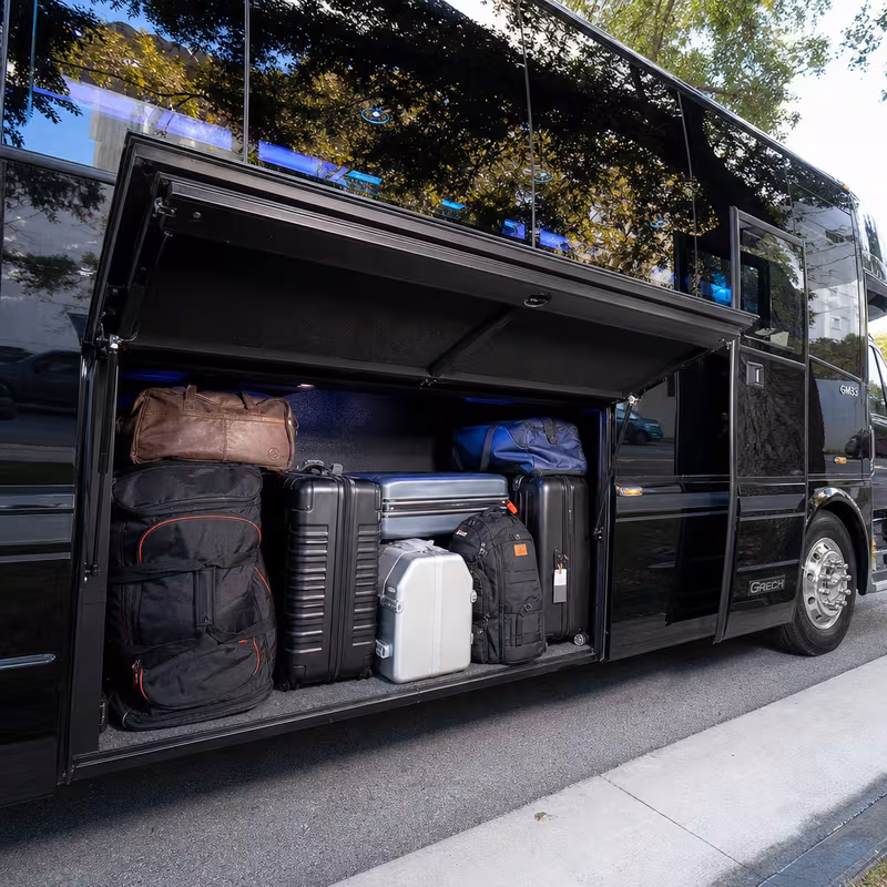 Party bus interior with wraparound leather seating and LED lighting in Washington