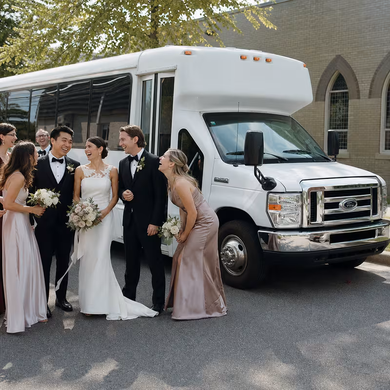 Passengers loading luggage while boarding an Washington group shuttle